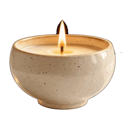 A single flame in Lili’s signature ceramic candle bowl.